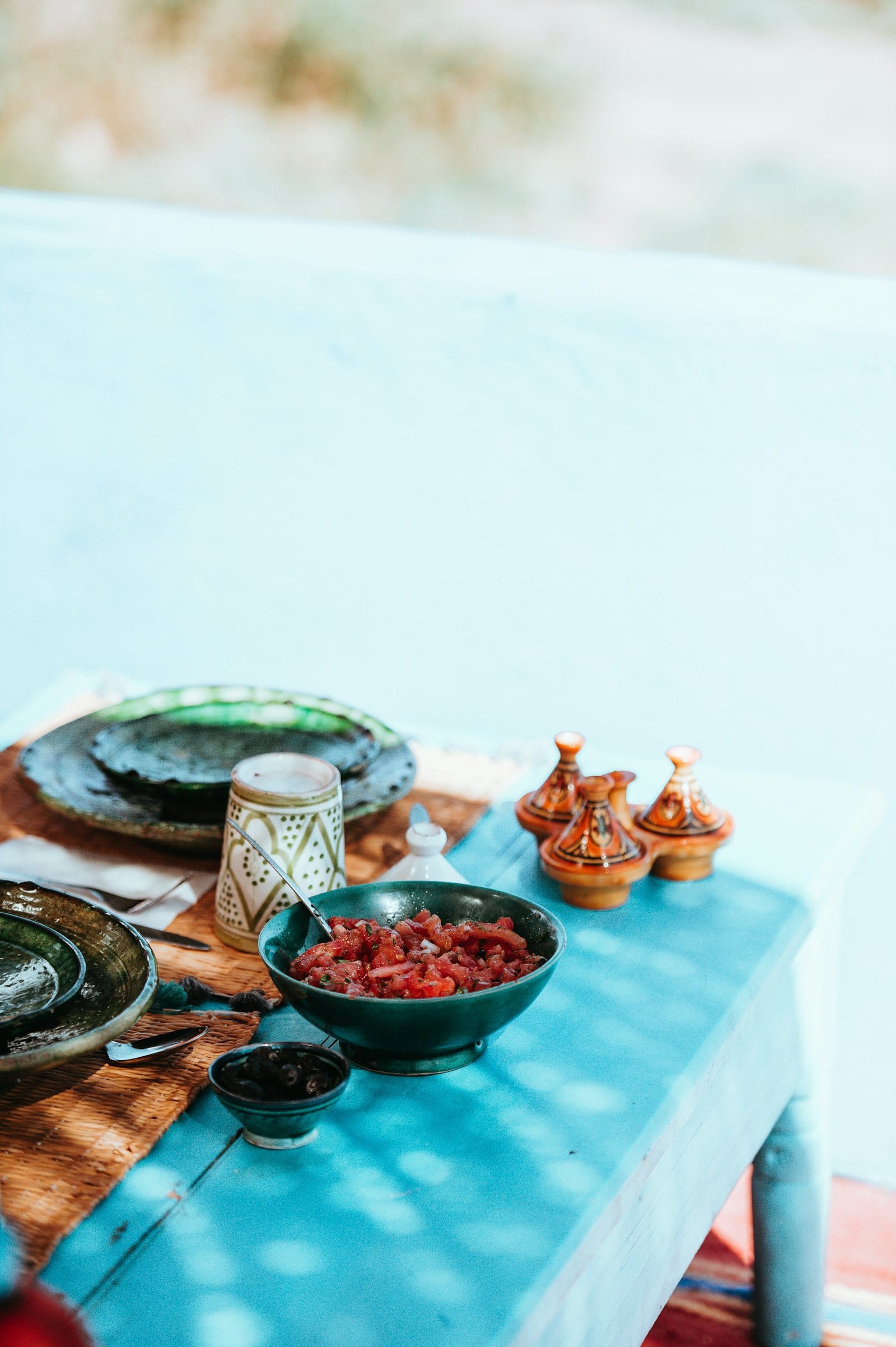 Traditional Moroccan dining table with tagine dishes